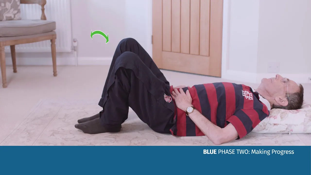 a person lying on a bed